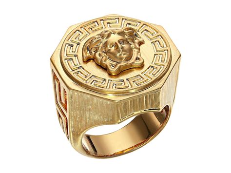 unmarked gold ring versace style.